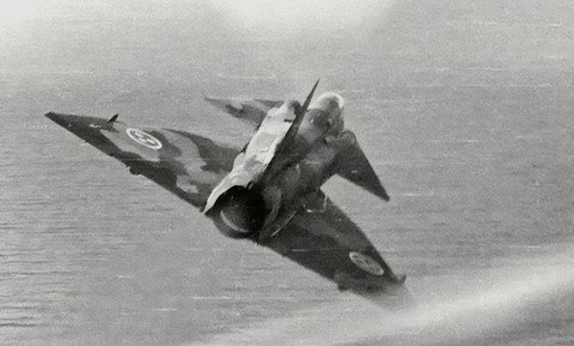 photograph from the Cold War era captures a Saab 37 Viggen in the midst of an intercept mission,